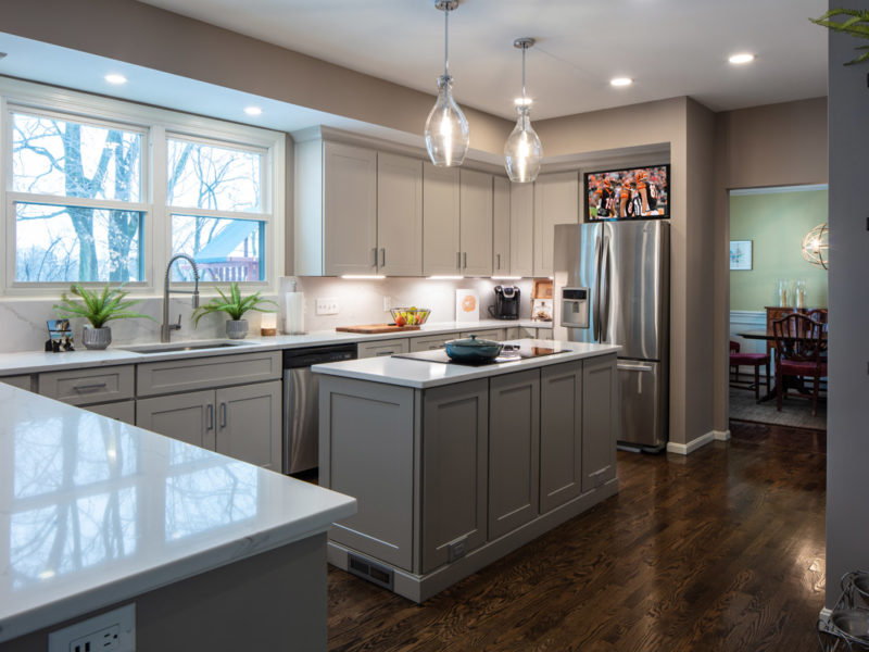 kitchen white shaker cabinets with gray island